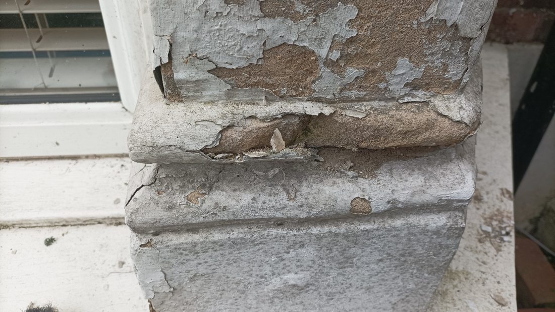 Exterior decorative surround before repainting