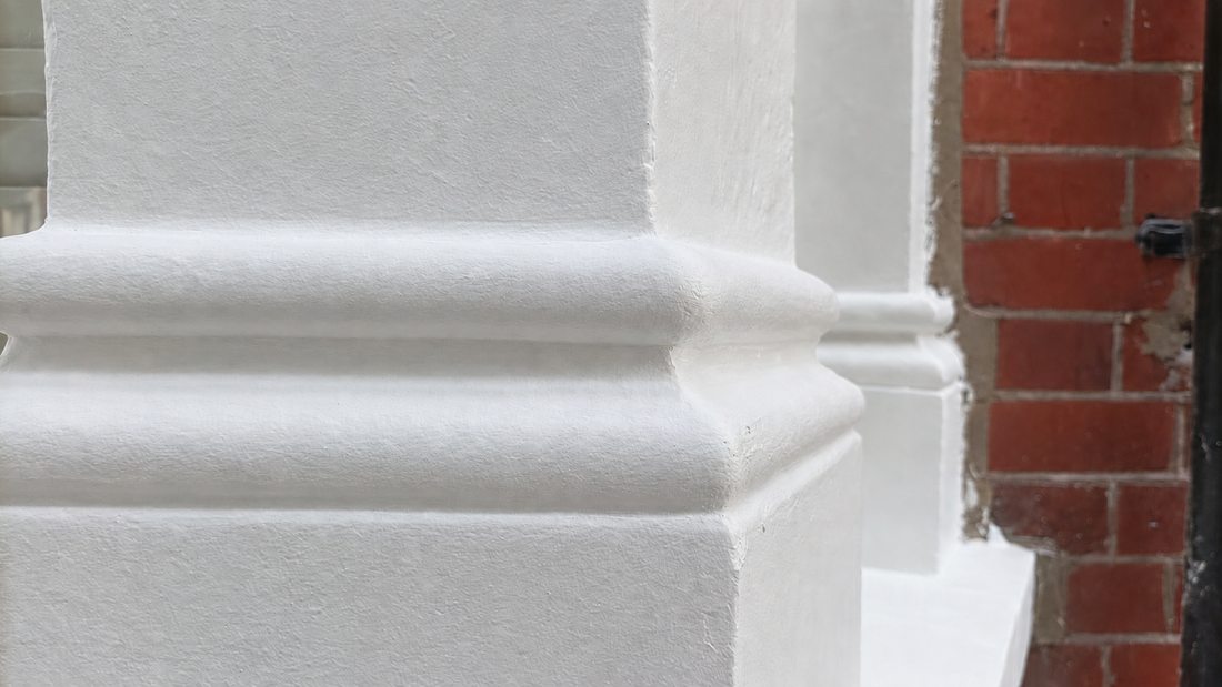 Exterior decorative surround after repainting